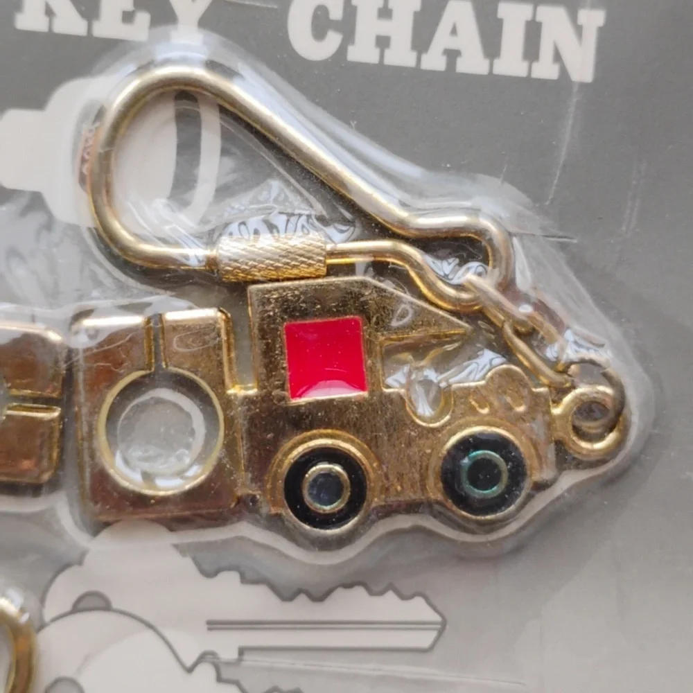 Set/2 Metal Key Chain with House and Truck Shaped Fob New in Packaging